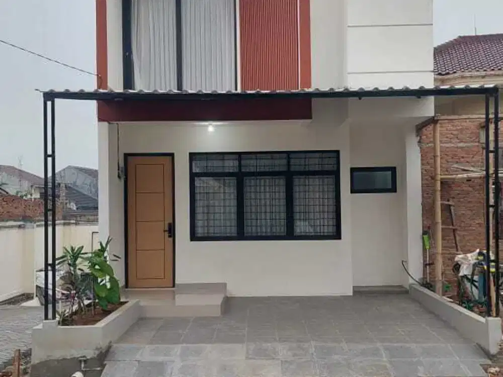 MURAH RUMAH 800 JUTAAN 2 LANTAI DEKET KE FASILITAS UMUM