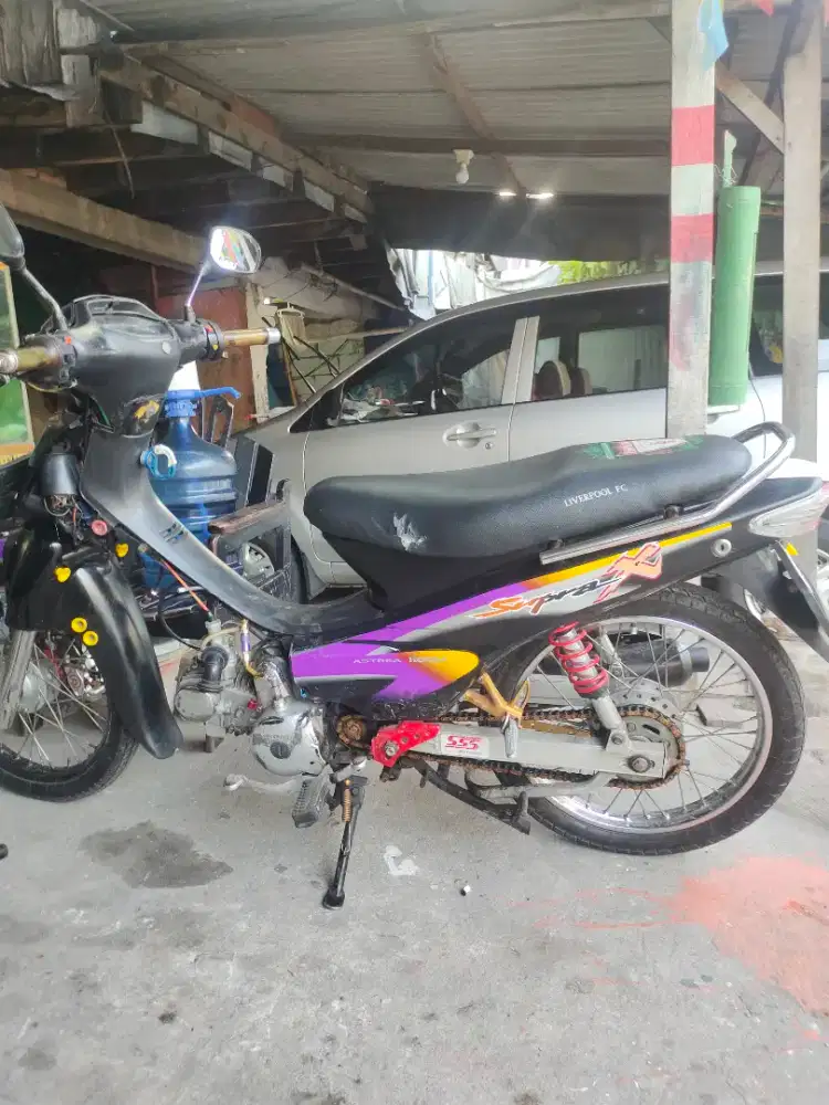 Motor bebek Supra x