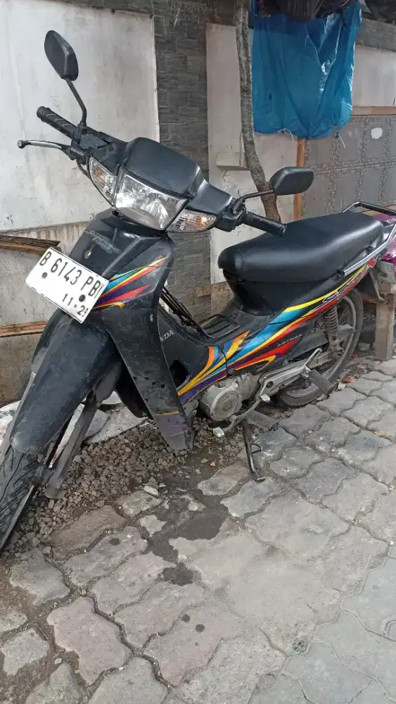 Honda Supra X tahun 2004.