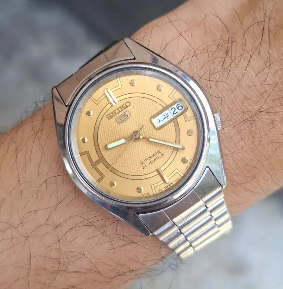 Seiko 7s26 gold dial