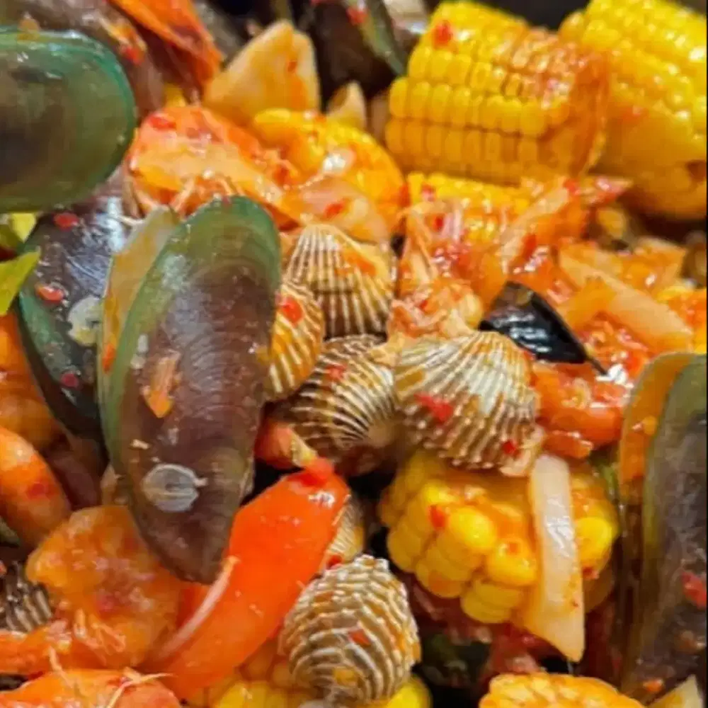 Koki masak seafood