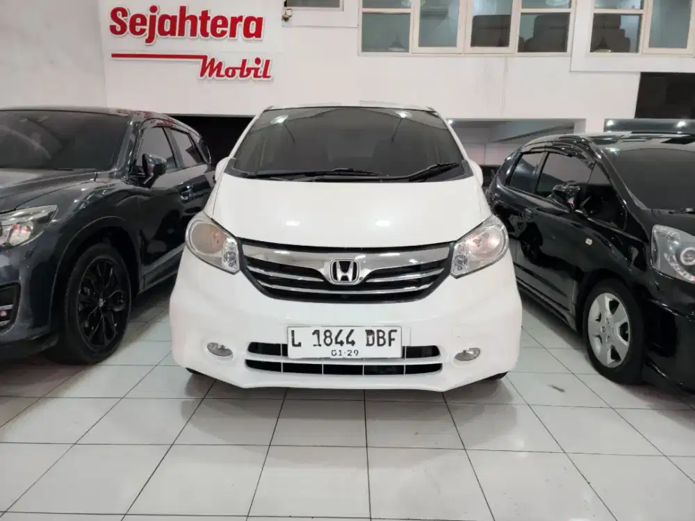 Km80rban tdp 25 juta honda freed E PSD ac dobel 2013 surabaya