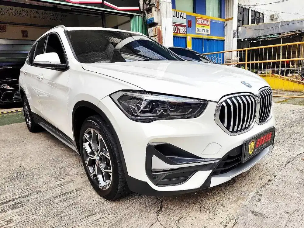 DP30JT BMW X1 XLINE PANORAMIC TERTINGGI
