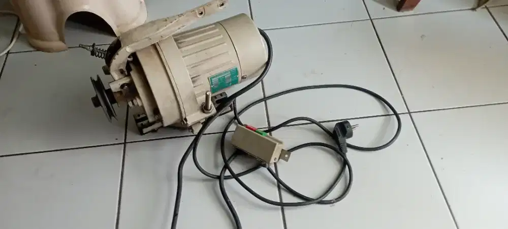 Dinamo mesin jahit juki