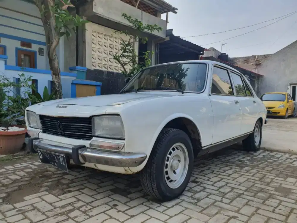 Peugeot 504 th 1980
Mesin sehat no ngebul
Sudah Power Stering