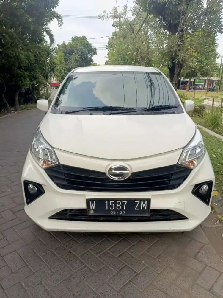 Sigra X deluxe 1.2 Metic