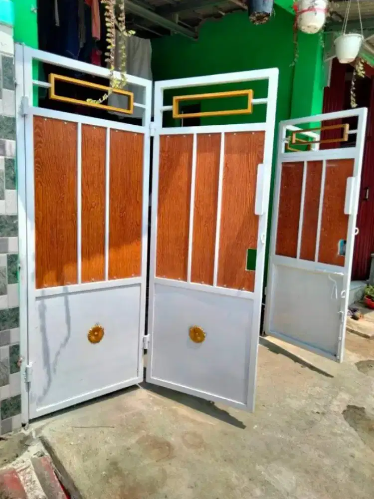 Tukang las pasang dan service pintu pagar garasi murah