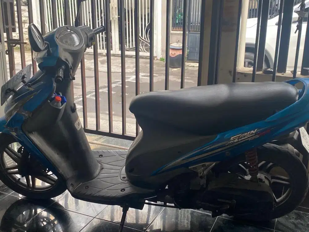 Spin 2009 warna biru