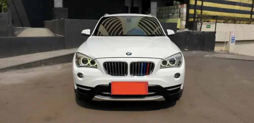 Dijual BMW X1 2013 putih pemakai langsung