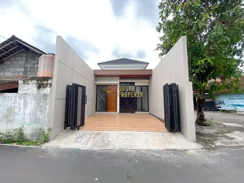 Rumah Akses Jalan Aspal dan Papasan 2 Mobil di Purwomartani Kalasan