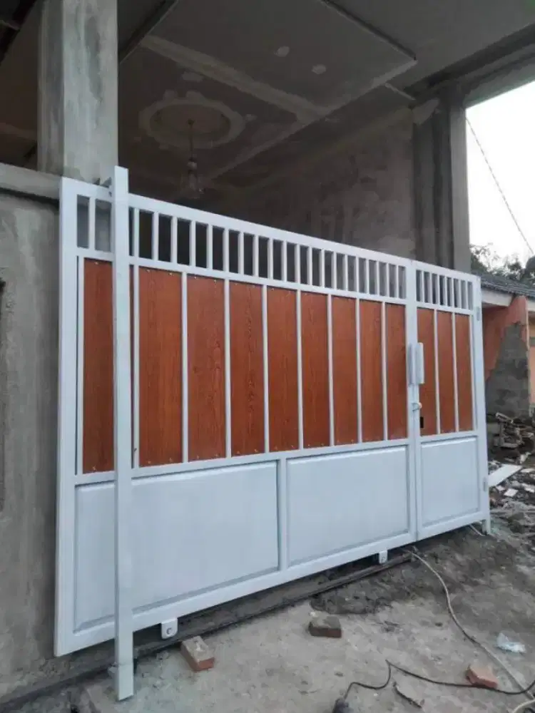 Tukang pasang aneka pintu pagar garasi murah