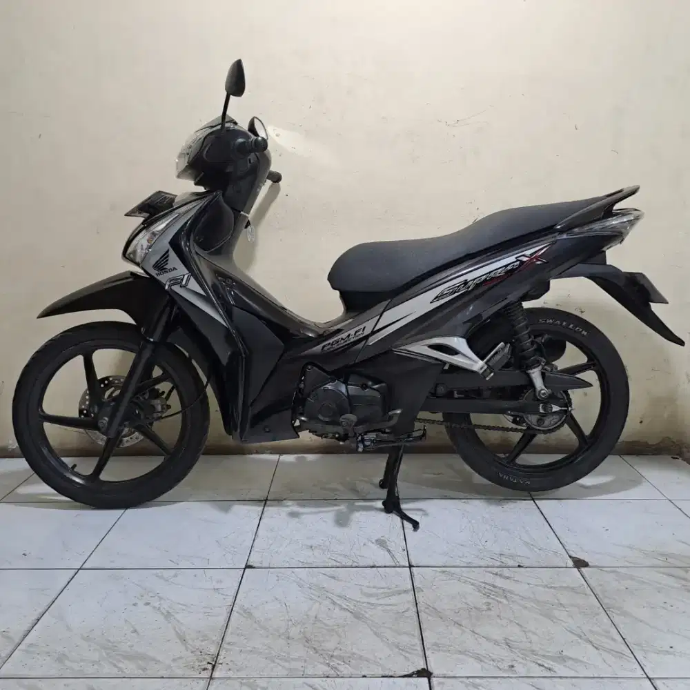 Honda supra x 125 fi helm in 2011