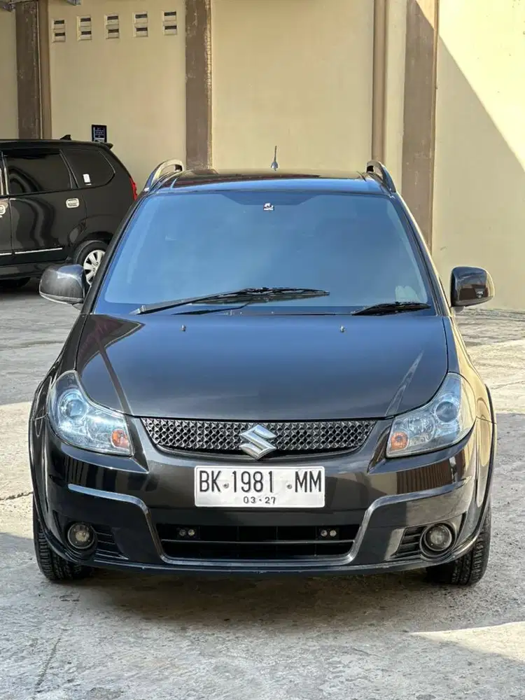 Suzuki x over manual 2011 sx4