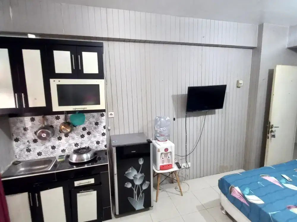 Sewa Apartemen grand emerald studio room furnished lt 2 view kolam
