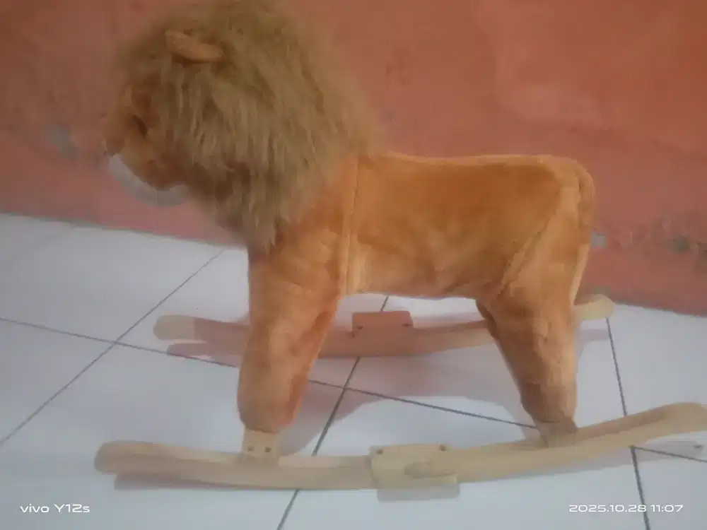 Mainan singa anak