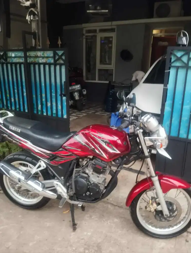 Scorpio z 2010 merah maroon