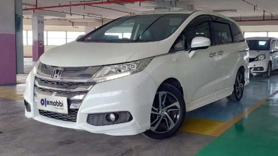 TDP 12JT Honda Odyssey 2.4 E Bensin-AT Hitam 2014