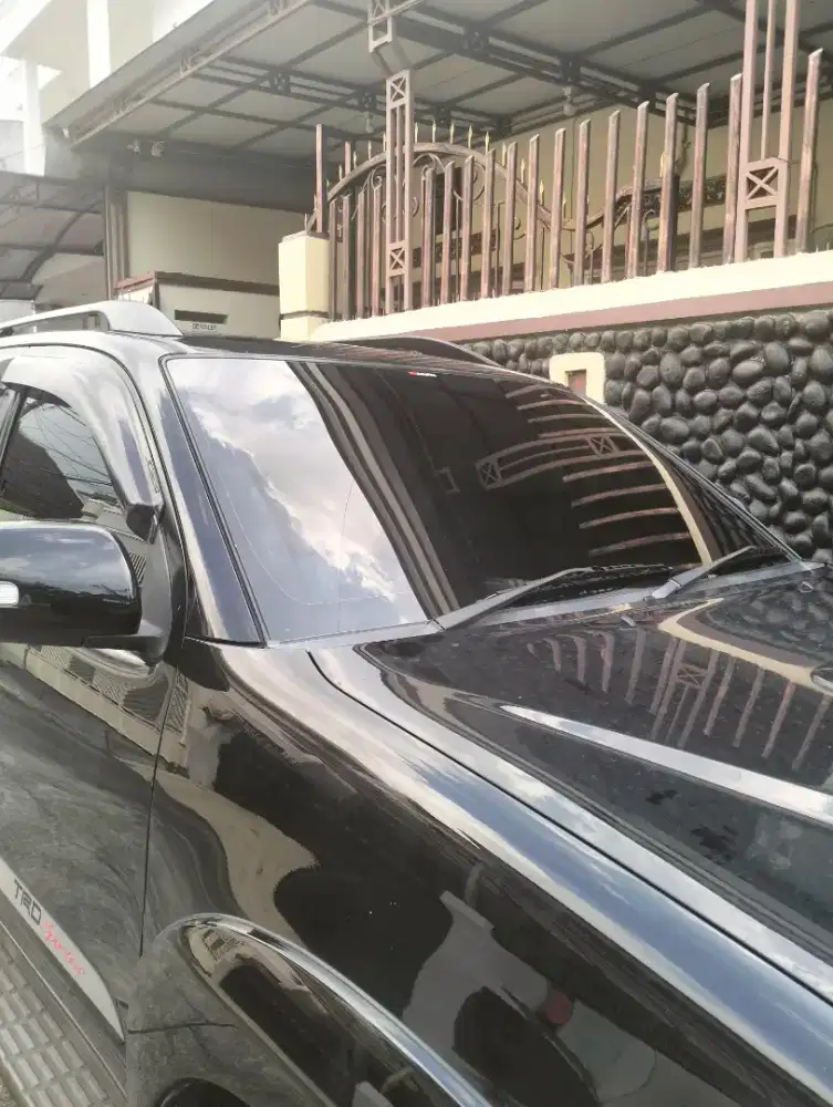 Melayani bongkar pasang kaca film mobil harga murah