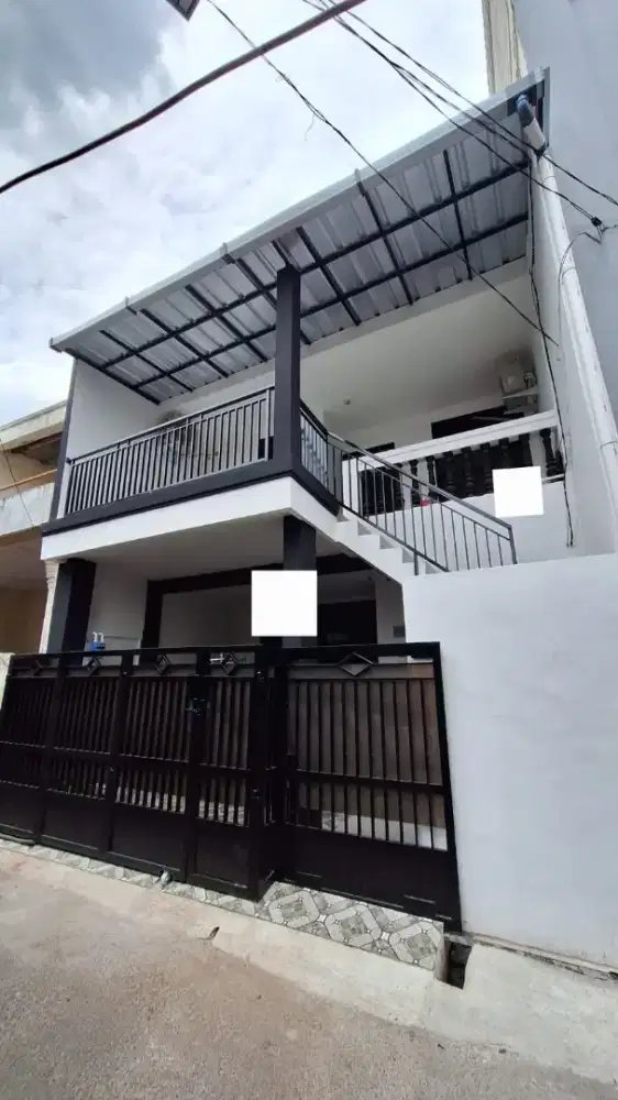 Dijual rumah dan usaha kos diatasnya di Duren Sawit, Jakarta Timur