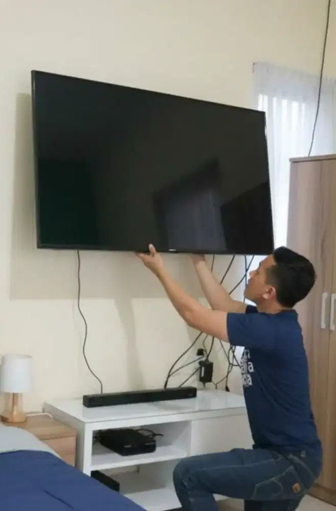 pemasangan & jual bracket utk gantungan tv led lcd di tembok kuat aman