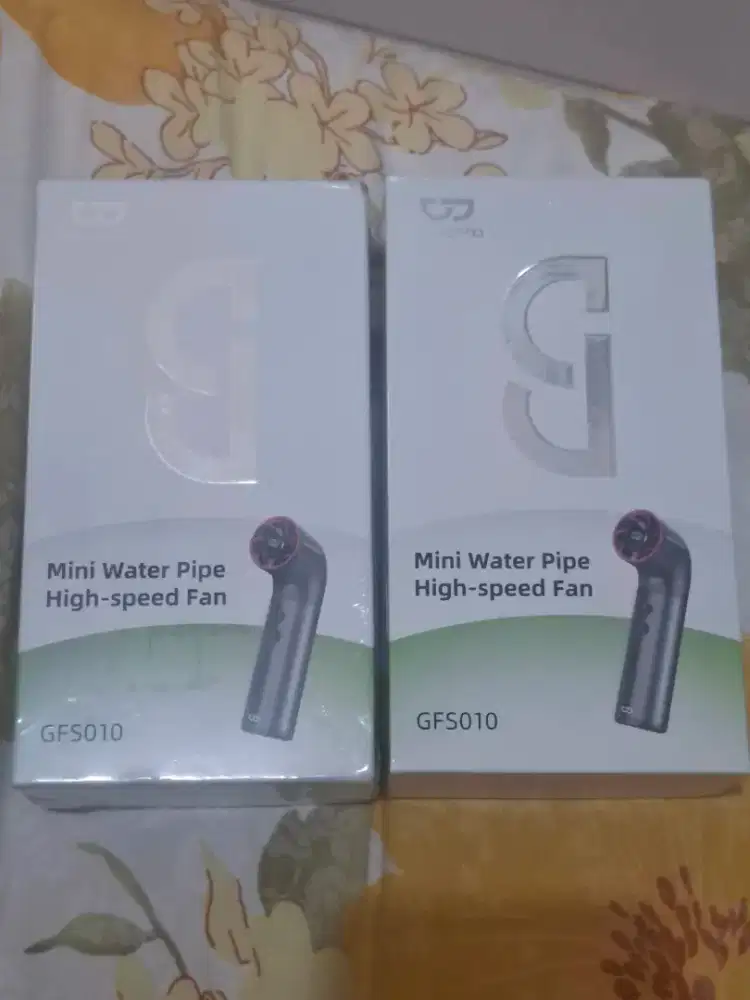 Kipas tangan elektronik goojodoq