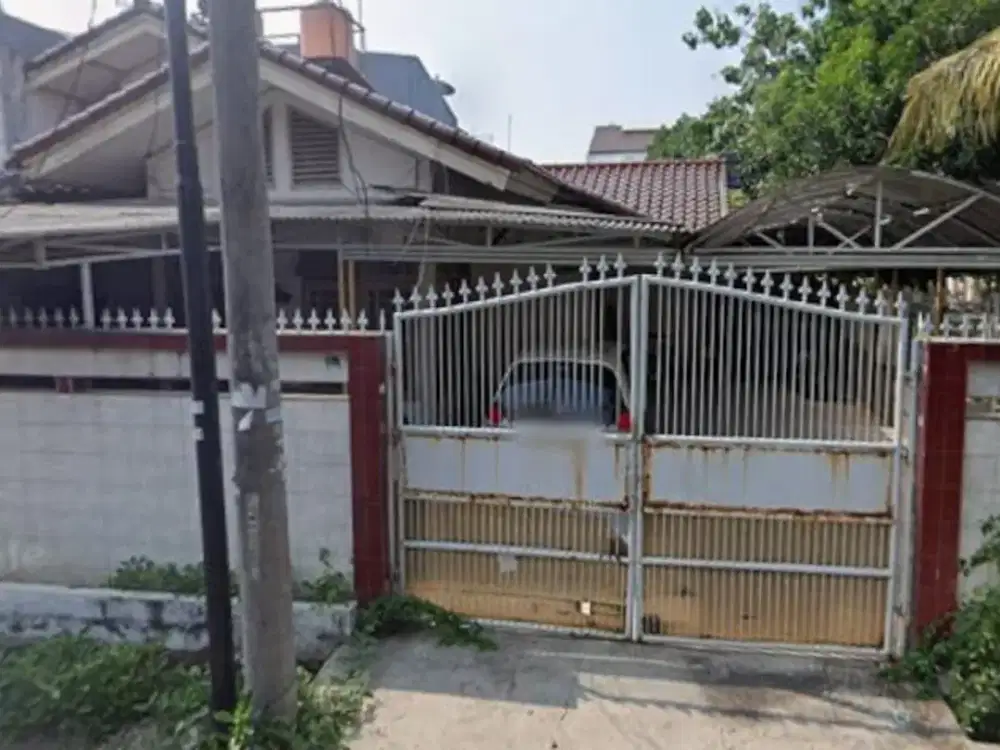 dijual rumah taman surya 2