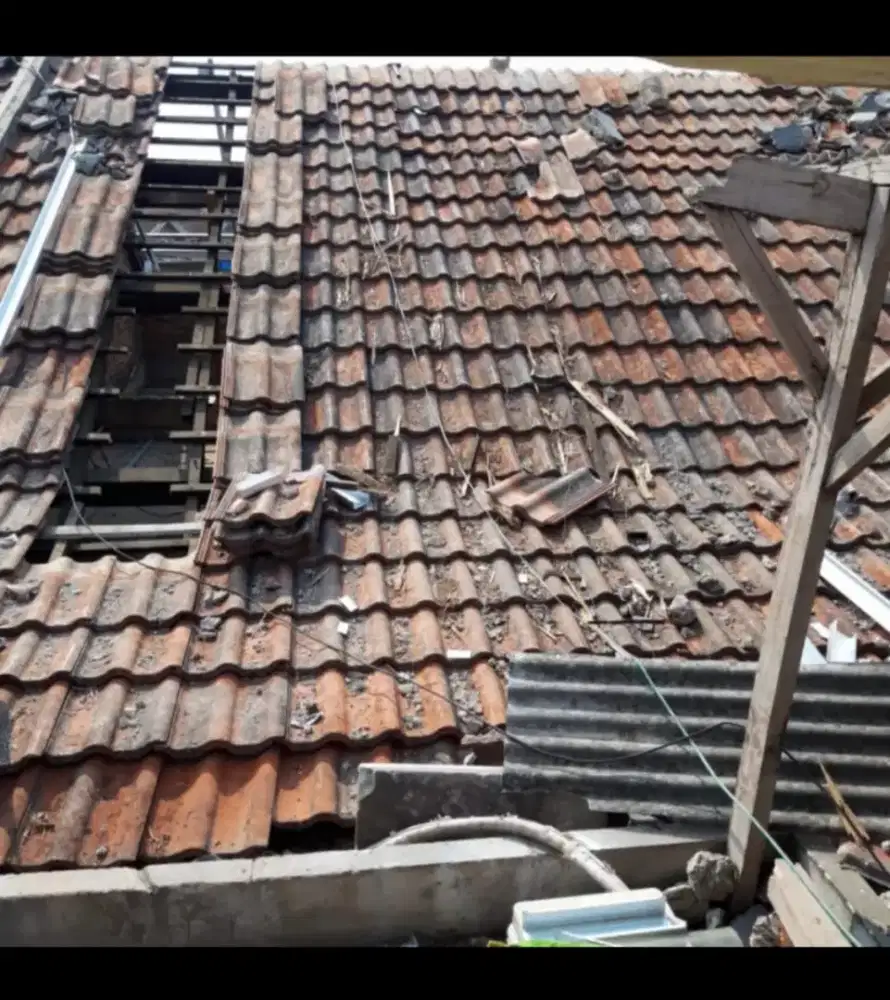 Bongkar pasang ganti atap baja ringan + genteng metal terpasang