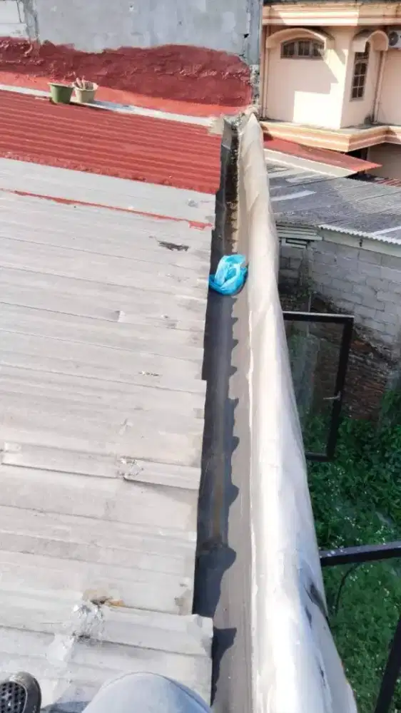 Tukang perbaikan atap bocor dinding dak rembes talang air renovasi DLL