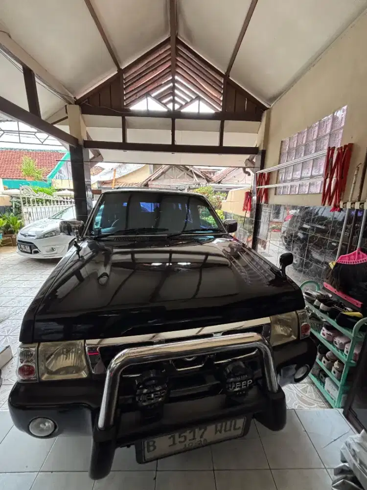 Nisan terrano spirit tahun 2003 MT