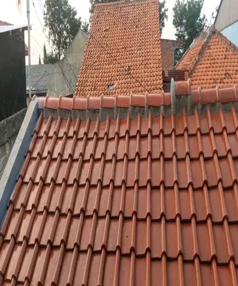 Tukang perbaikan atap bocor dinding dak rembes talang air renovasi DLL