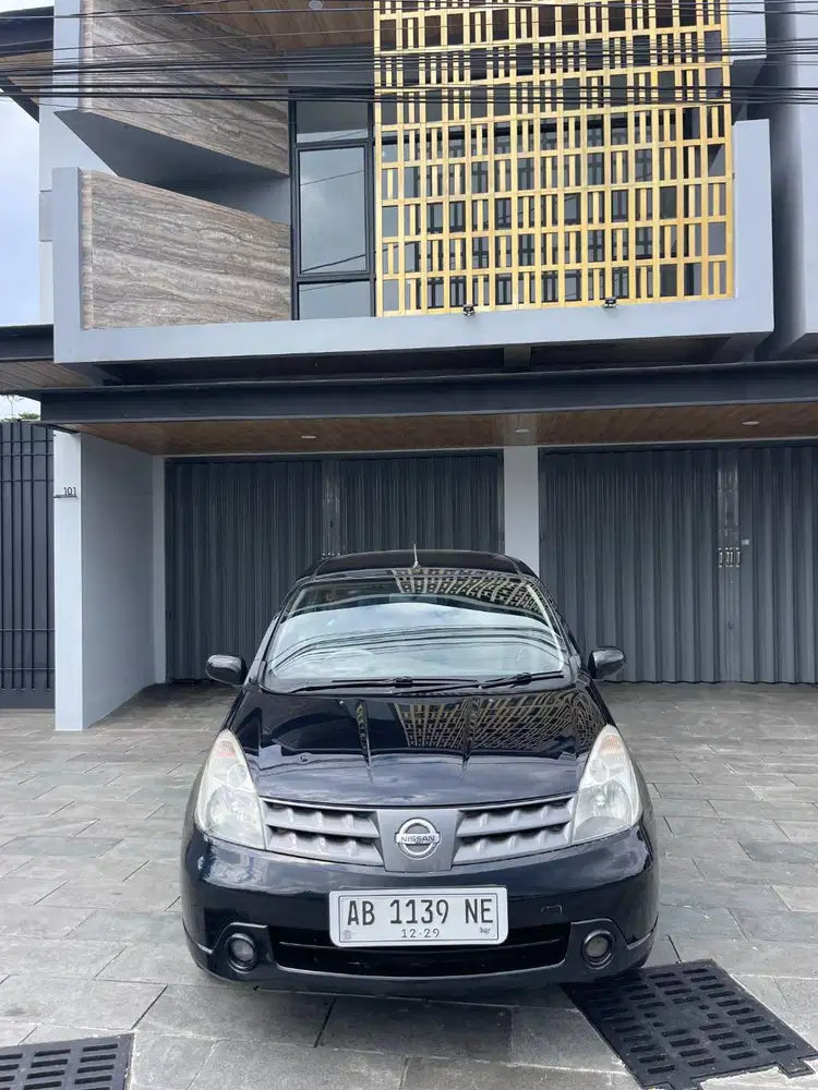 GRAND LIVINA SV M/T 2009