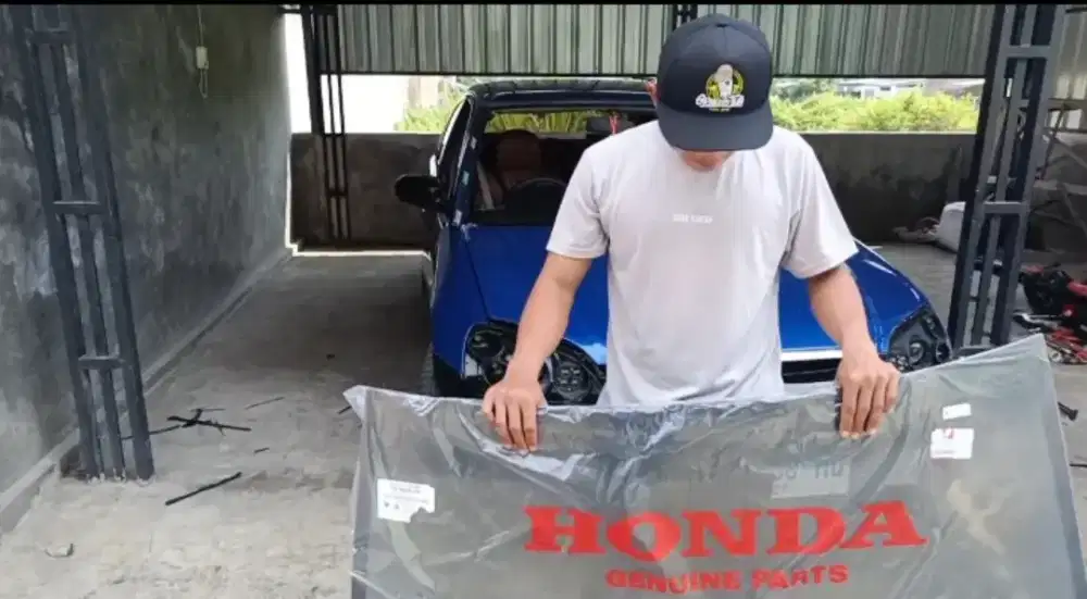 Kaca mobil baru bergaransi