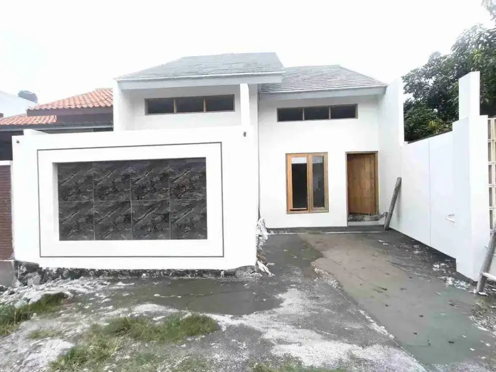 rumah progres finishing lingkungan perumahan lokasi ngemplak kartasura dekat kampus UIN