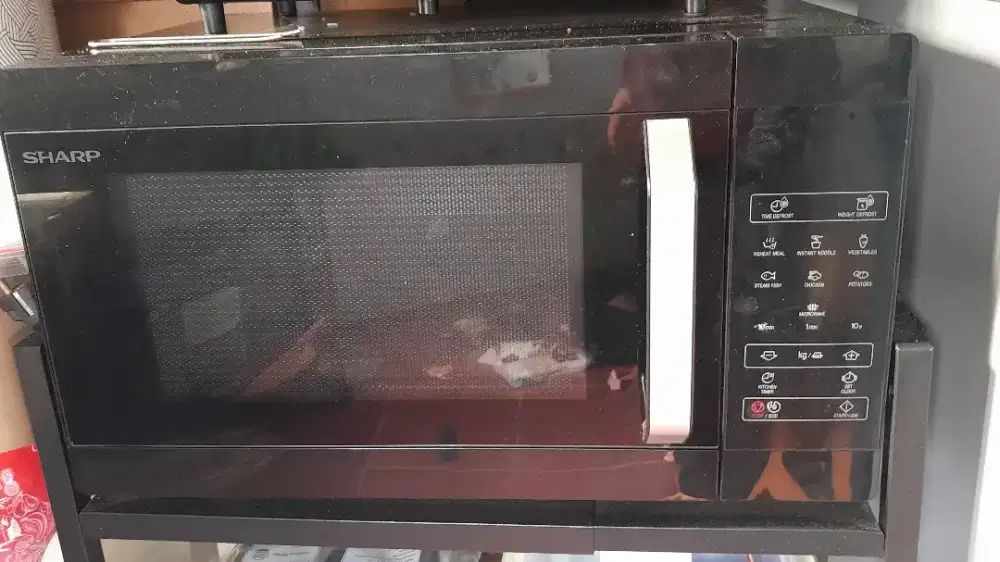 microwave oven  merk sharp type R223DA-BK