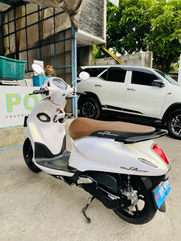 Grand Filano putih Deva motor