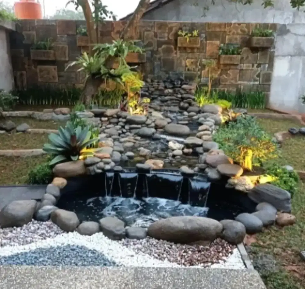 Mnrima dkorasi kolam air mancur batu alam tebing