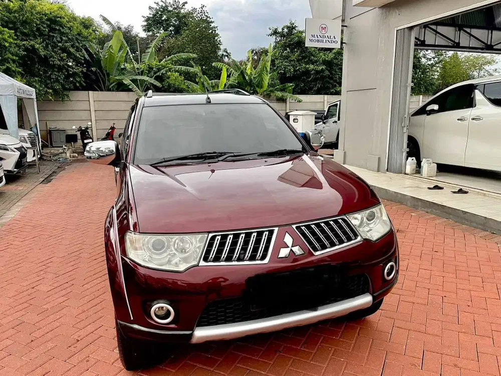 Pajero sport 2.5 exceed diesel 2011 AT red metallic