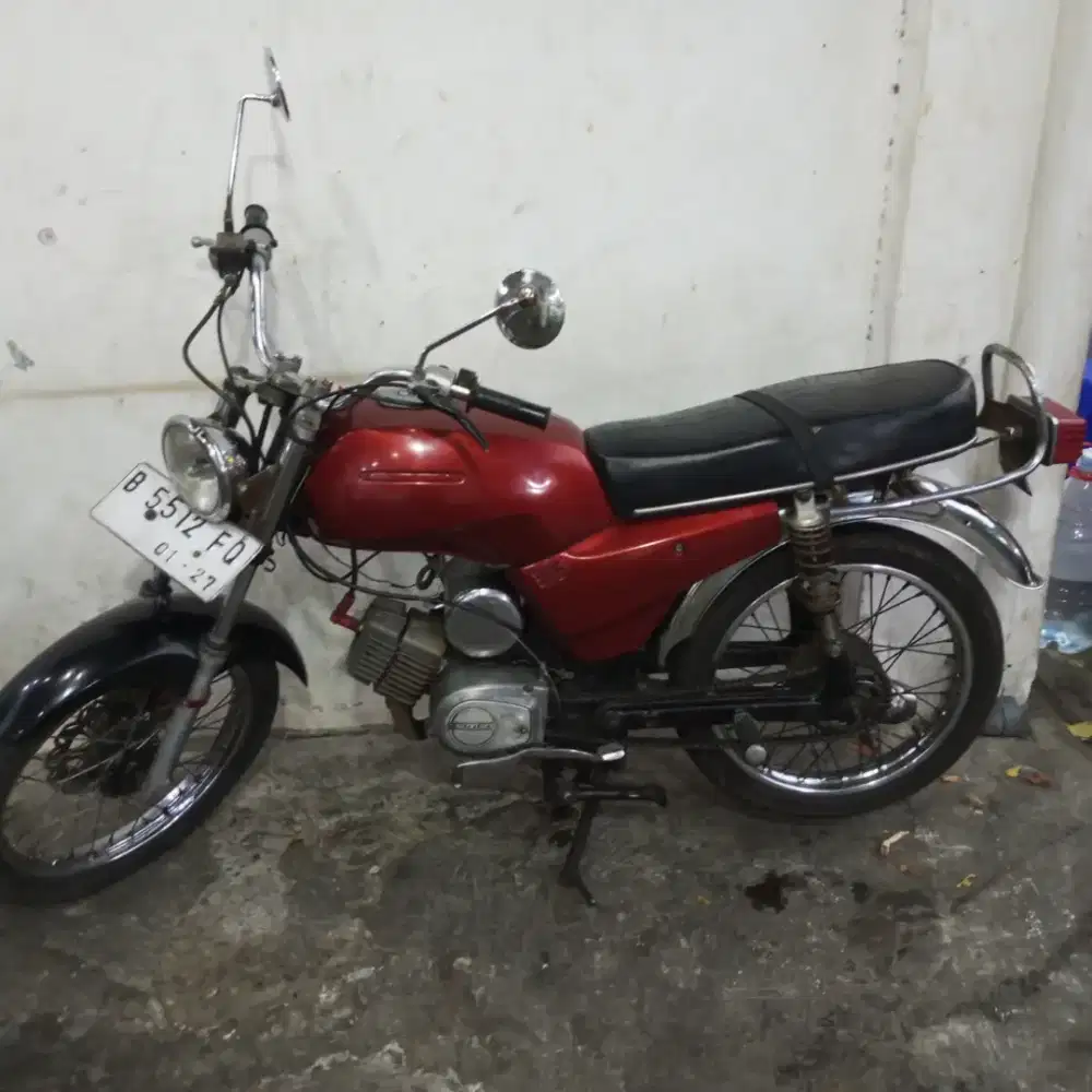 Suzuki A 100 motor tua