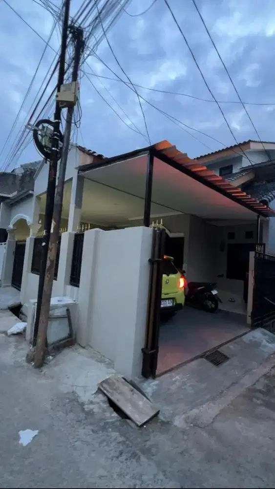 Jual rumah baru selesai renov, bebas banjir, full granit, siap huni