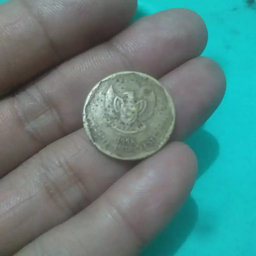 Koin kuno 100rp karapan sapi 1998