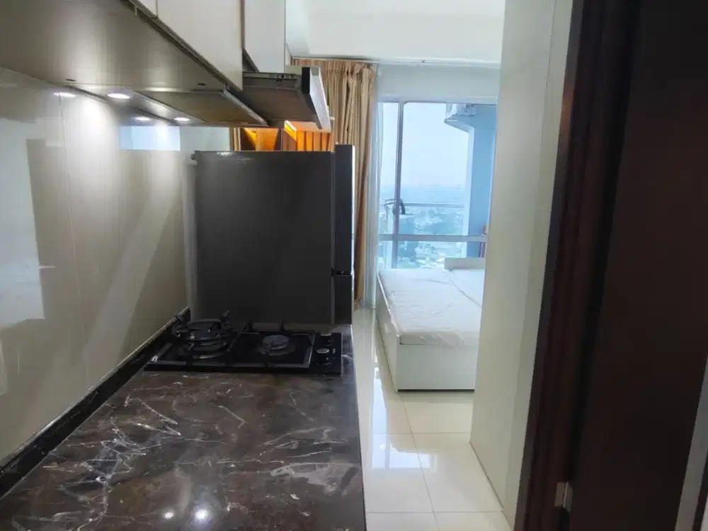 Disewakan Unit Tipe Studio di Apartemen Puri Mansion Luas 21 m2 Kondisi Full Furnish Interior Senada Bikin Betah di Unit Harga Logis 23 Juta/Tahun Net