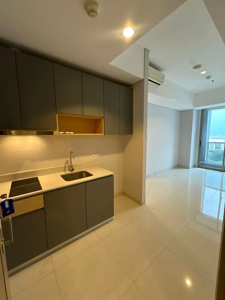 disewakan 2 Bedroom semi furnish taman anggrek residence