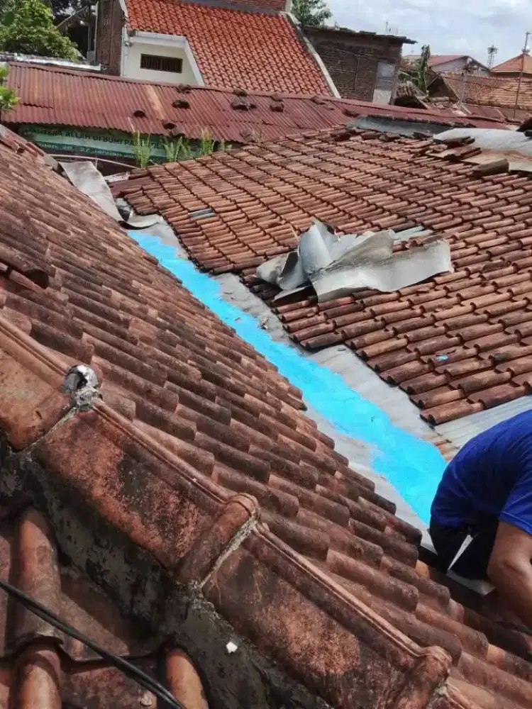 Tukang perbaikan atap bocor dinding dak rembes talang air renovasi DLL