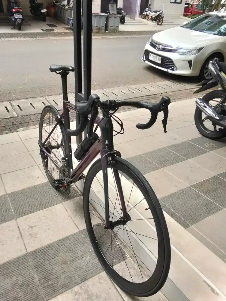 Sepeda roadbike karbon, mau pindah luar kota