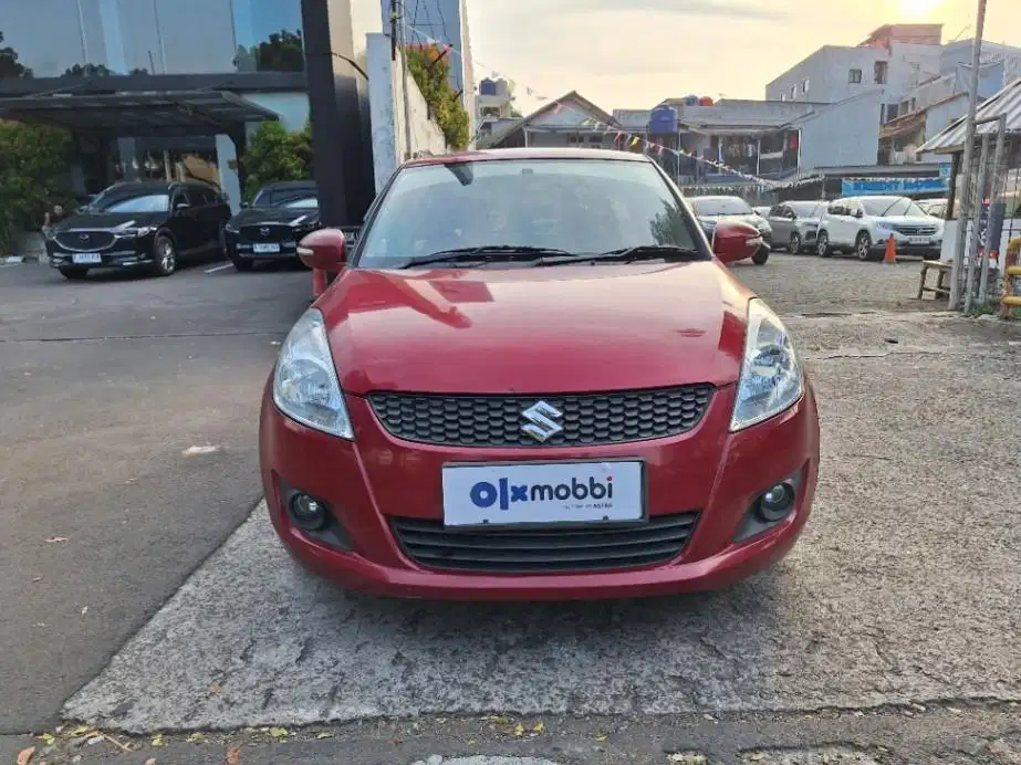 DP MURAH Suzuki Swift 1.4 GX Bensin-MT 2013 Merah CKZGB