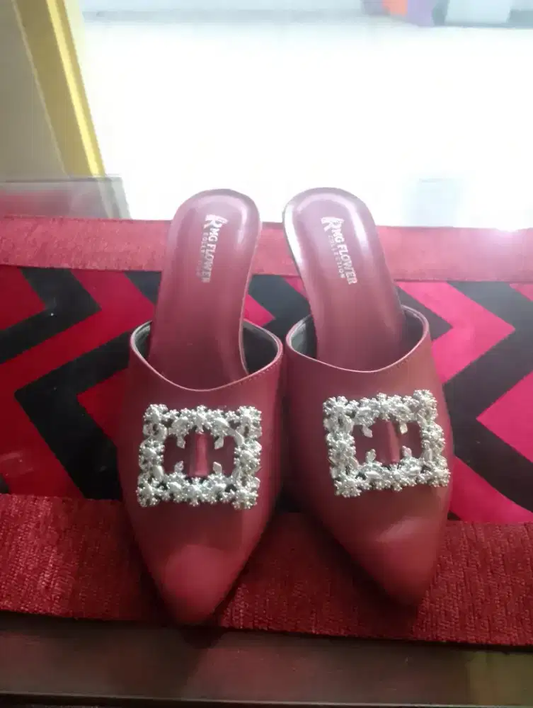 Sepatu merah masih bagus dan awet