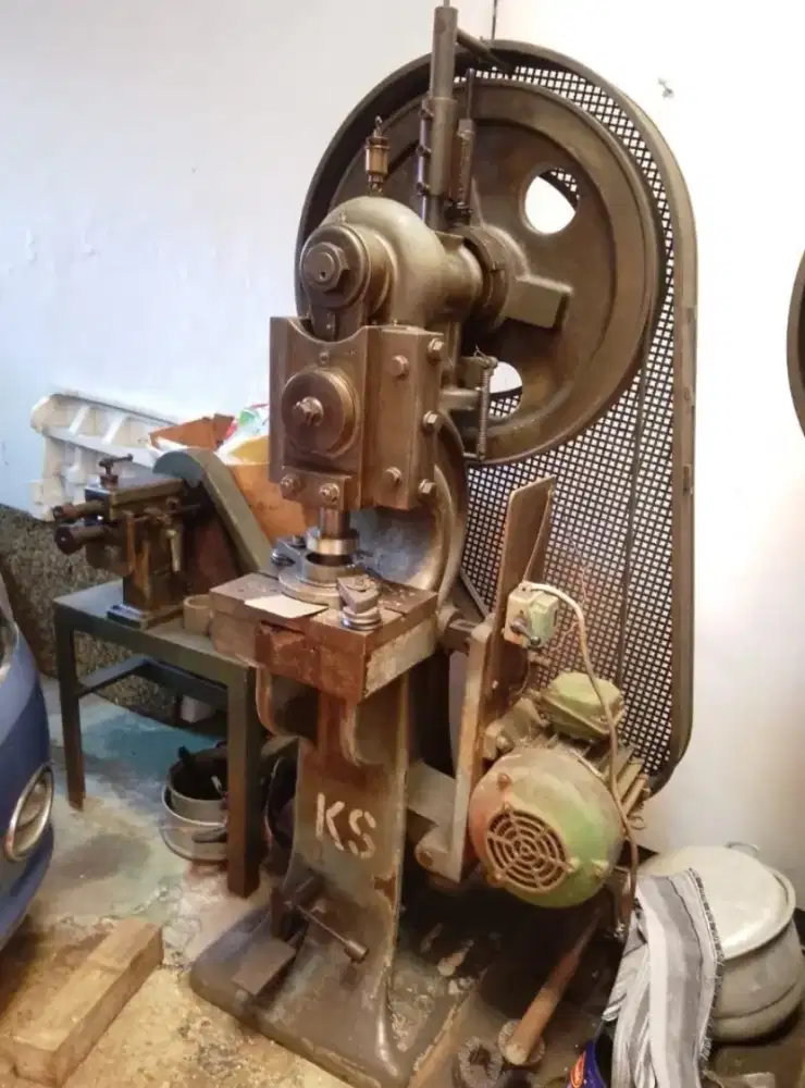 Eccentric mechanical power press.