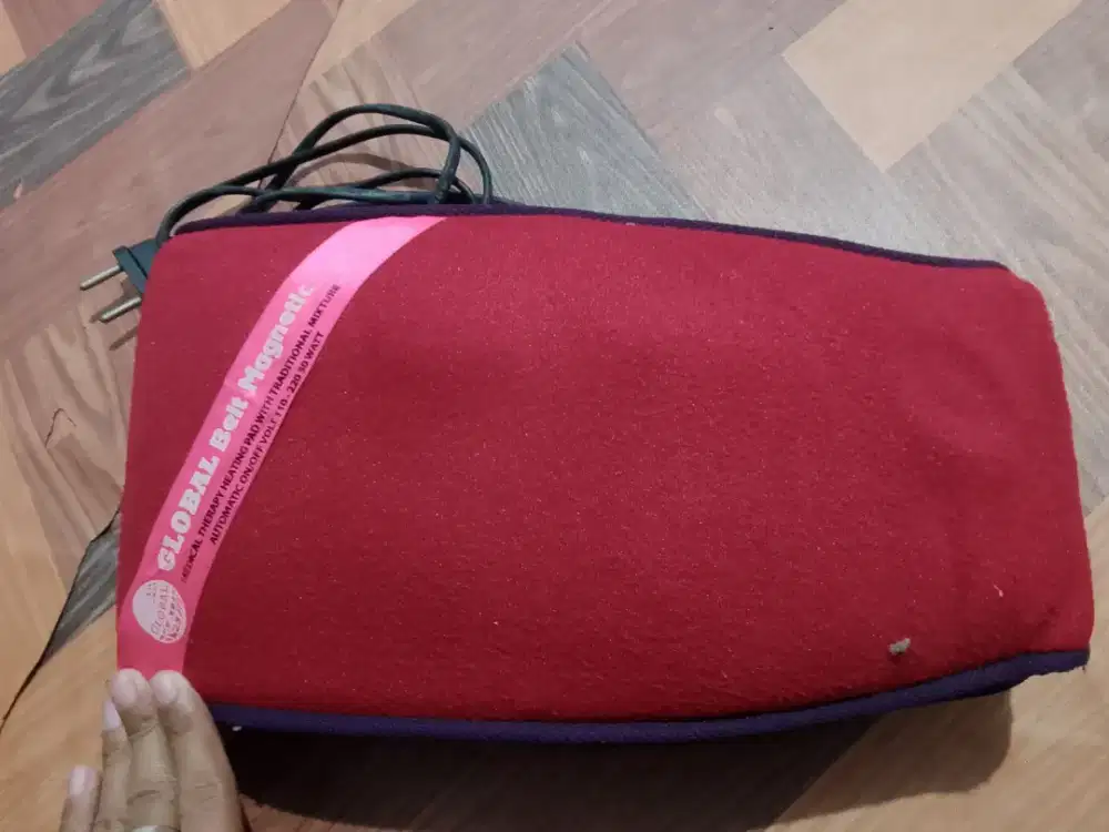 Sabuk / bantal pemanas terapi