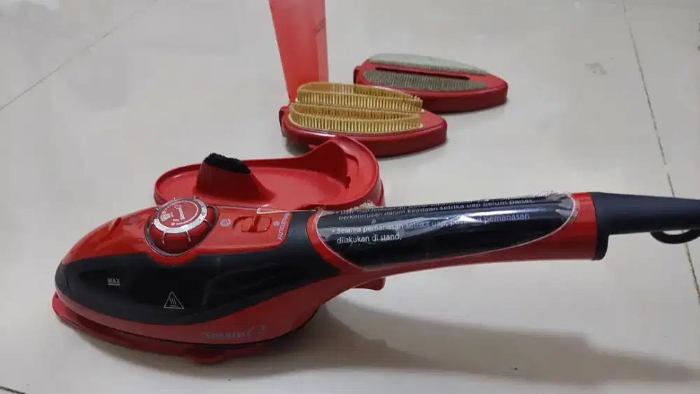 Strika uap bekas pemakaian merk STEAM Q