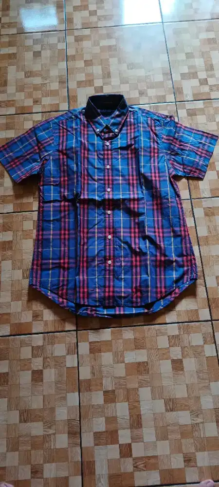 Kemaja polo ukuran L